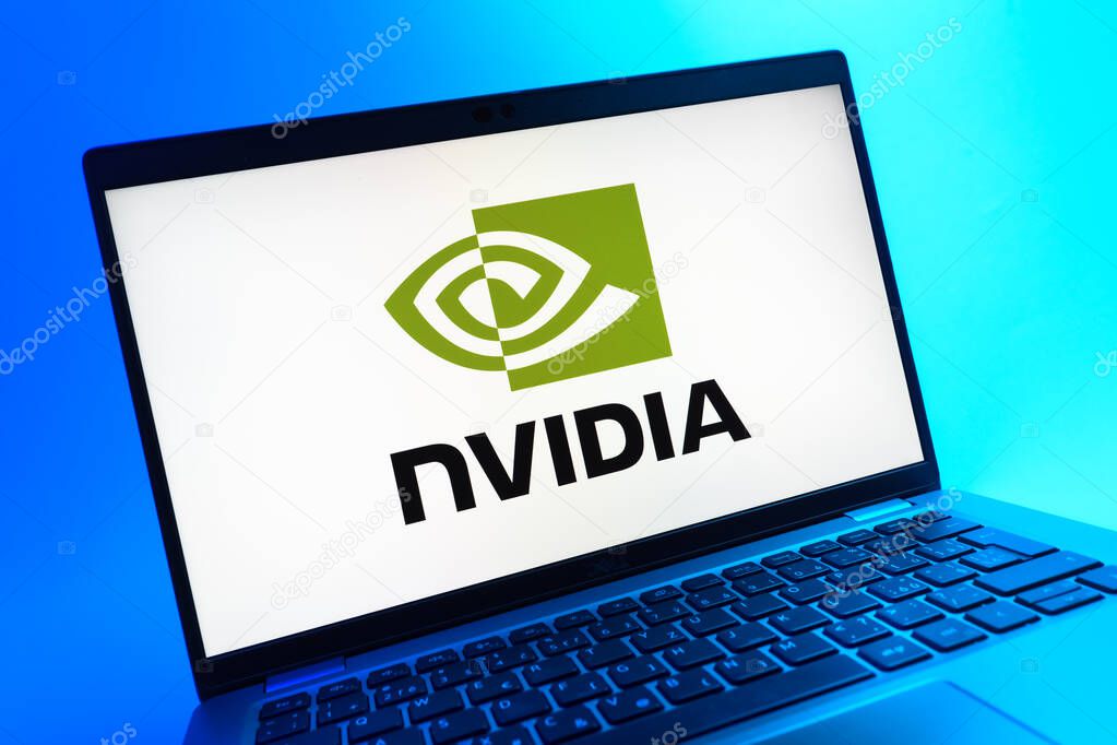 Prague, Czechia - 05 08 2025: A close-up view of a laptop lying on a colorful background, showing NVIDIA logo.
