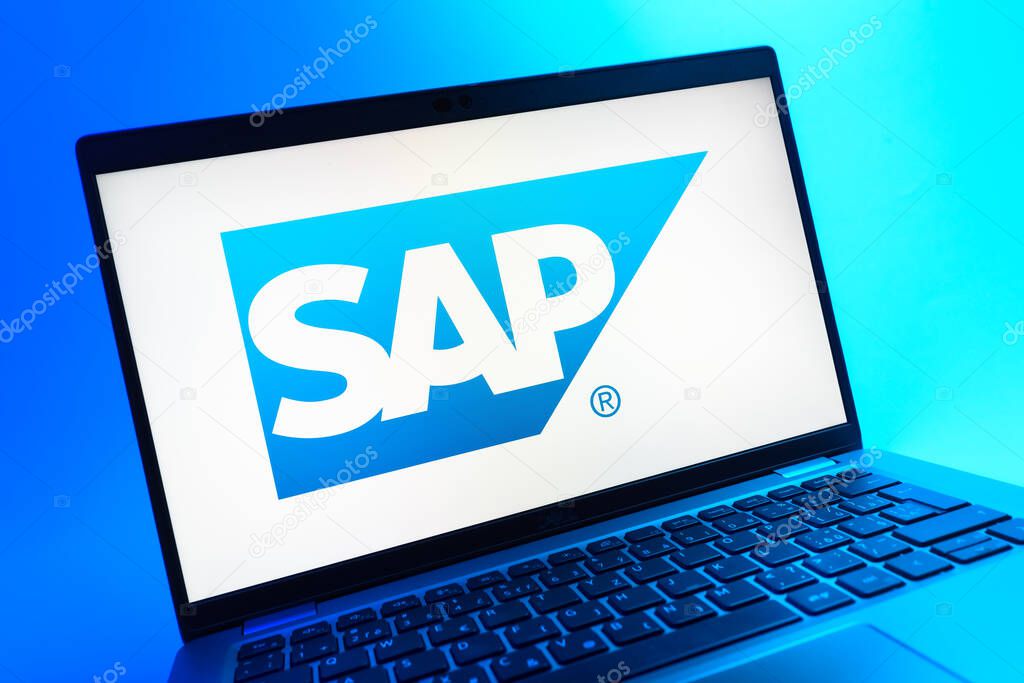 Prague, Czechia - 05 08 2025: A close-up view of a laptop lying on a colorful background, showing SAP logo.