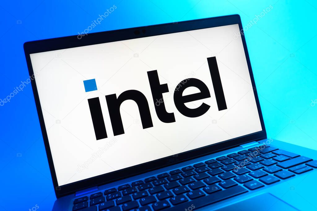 Prague, Czechia - 05 08 2025: A close-up view of a laptop lying on a colorful background, showing Intel logo.