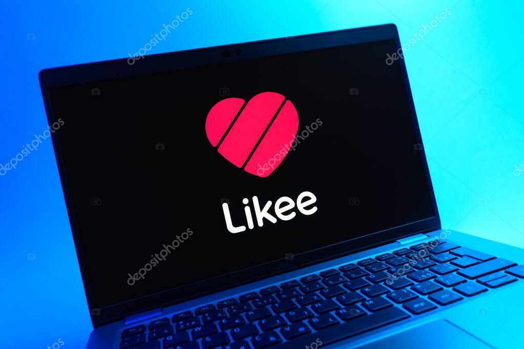 Prague, Czechia - 05 08 2025: A close-up view of a laptop lying on a colorful background, showing Likee logo.
