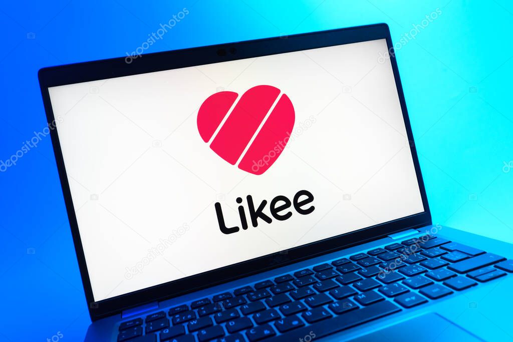 Prague, Czechia - 05 08 2025: A close-up view of a laptop lying on a colorful background, showing Likee logo.