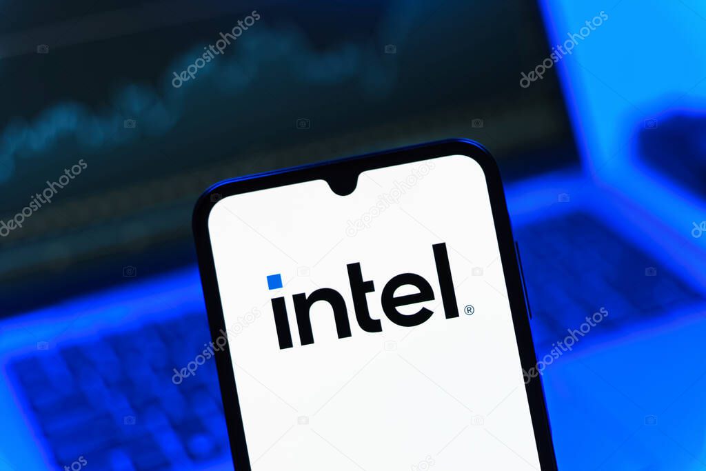 Prague, Czechia - 05 08 2025: Smartphone on surface showing Intel logo.