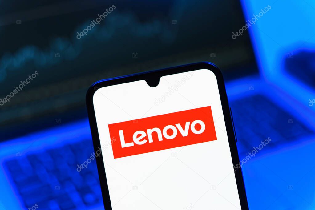 Prague, Czechia - 05 08 2025: Smartphone on surface showing Lenovo logo.