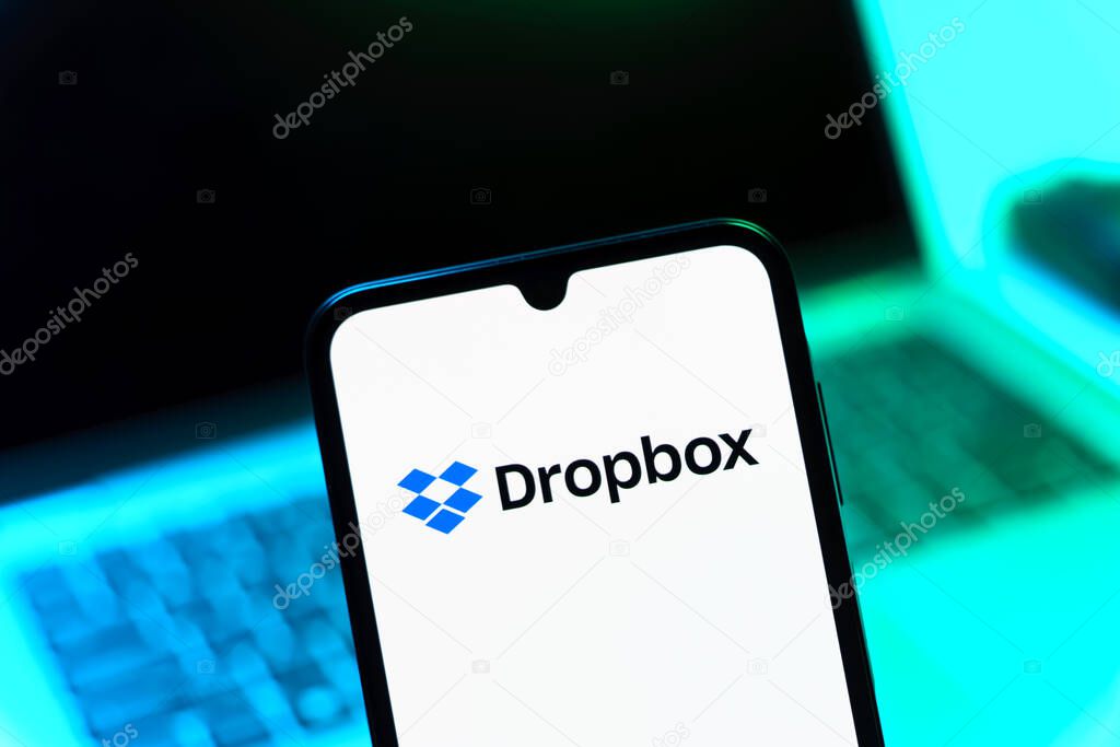 Prague, Czechia - 05 08 2025: Smartphone on surface showing Dropbox logo.
