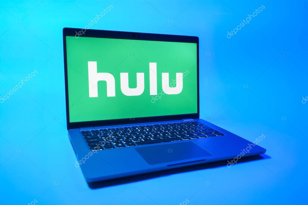 Prague, Czechia - 08 01 2025: A laptop on a uniform background displays the Hulu logo. Hulu is a streaming platform for TV shows, movies, and live TV.
