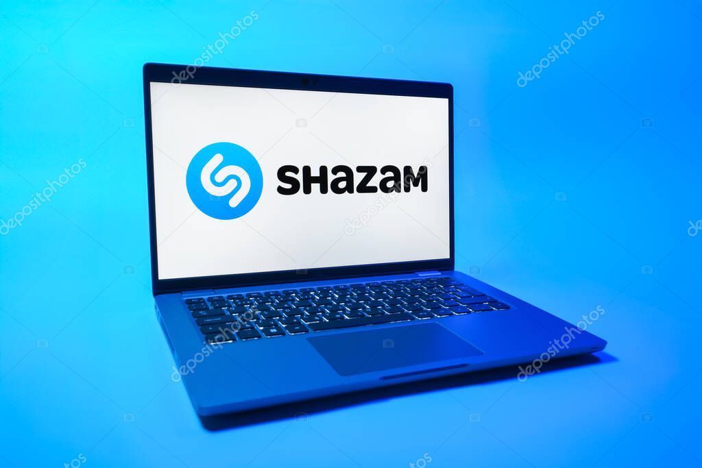 Prague, Czechia - 08 01 2025: A laptop on a uniform background displays the Shazam logo. Shazam is an app for identifying songs and music tracks.