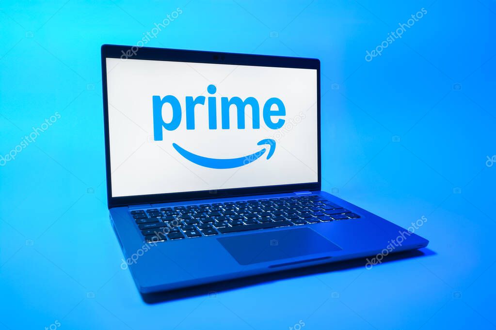 Prague, Czechia - 08 01 2025: A laptop on a uniform background displays the Prime logo. Prime is a subscription service for shopping, streaming, and benefits.