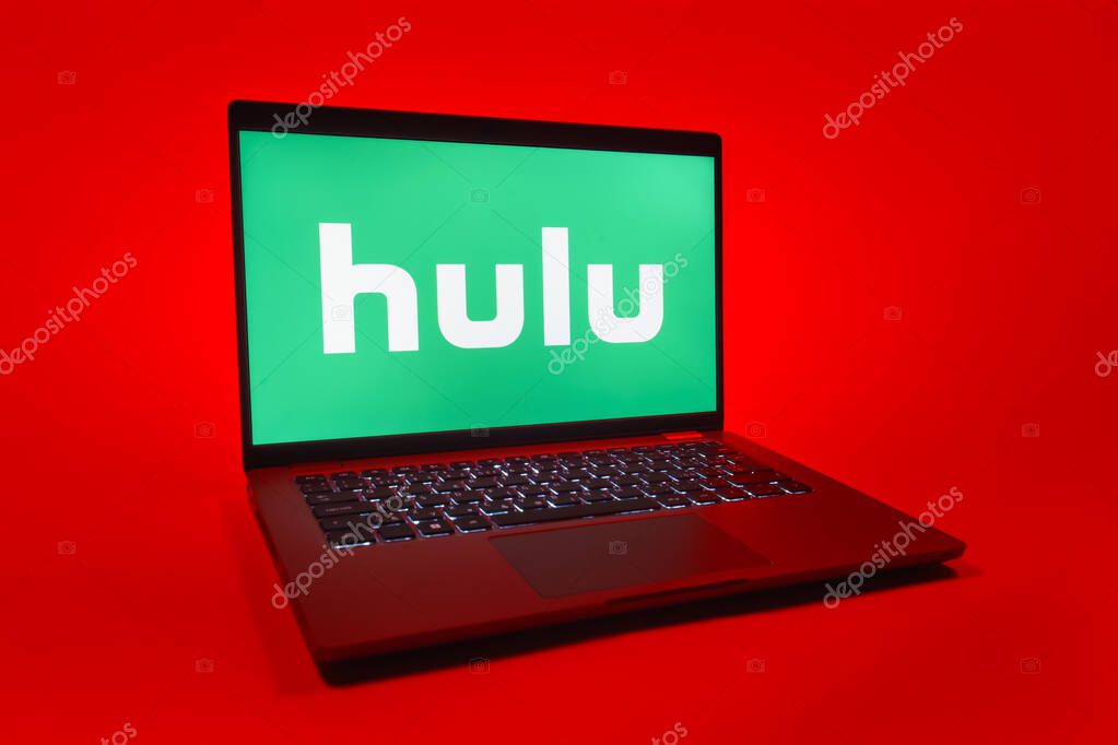 Prague, Czechia - 08 01 2025: A laptop on a uniform background displays the Hulu logo. Hulu is a streaming platform for TV shows, movies, and live TV.