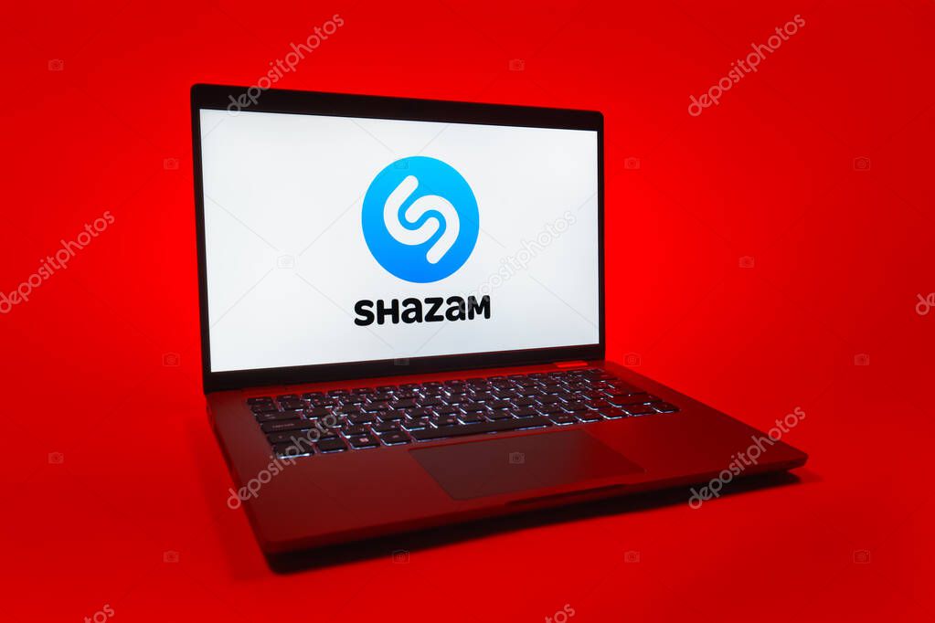 Prague, Czechia - 08 01 2025: A laptop on a uniform background displays the Shazam logo. Shazam is an app for identifying songs and music tracks.