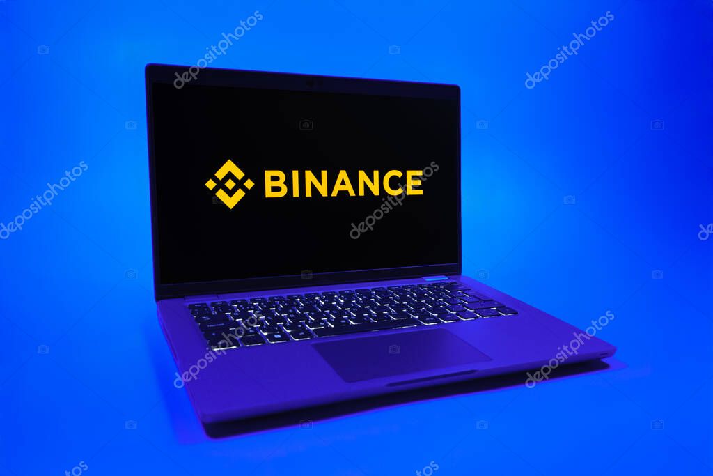 Prague, Czechia - 08 01 2025: A laptop on a uniform background displays the Binance logo. Binance is a cryptocurrency exchange for trading digital assets.