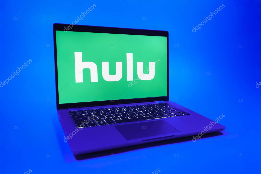 Prague, Czechia - 08 01 2025: A laptop on a uniform background displays the Hulu logo. Hulu is a streaming platform for TV shows, movies, and live TV.