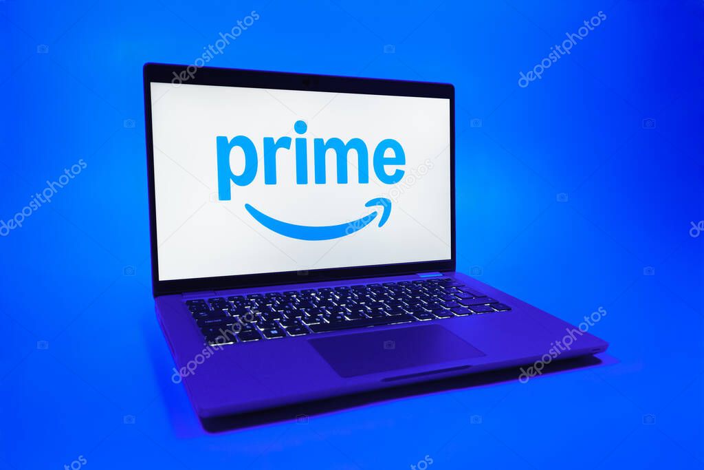 Prague, Czechia - 08 01 2025: A laptop on a uniform background displays the Prime logo. Prime is a subscription service for shopping, streaming, and benefits.