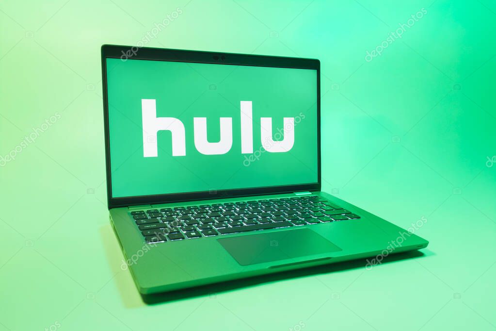 Prague, Czechia - 08 01 2025: A laptop on a uniform background displays the Hulu logo. Hulu is a streaming platform for TV shows, movies, and live TV.