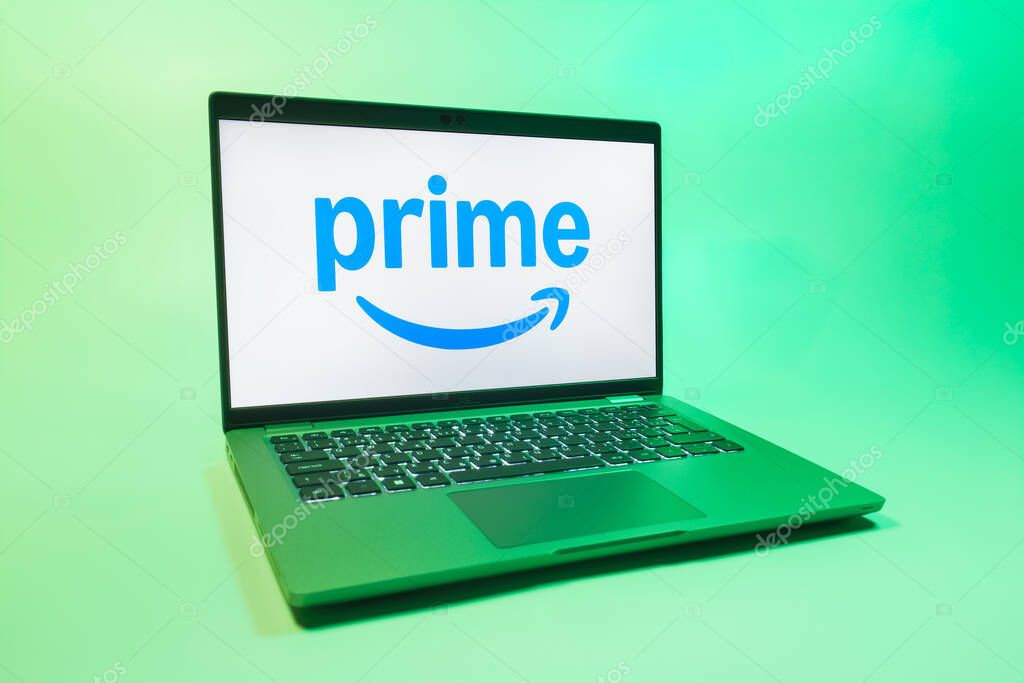Prague, Czechia - 08 01 2025: A laptop on a uniform background displays the Prime logo. Prime is a subscription service for shopping, streaming, and benefits.