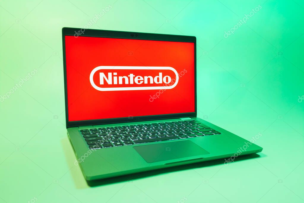 Prague, Czechia - 08 01 2025: A laptop on a uniform background displays the Nintendo logo. Nintendo is a company producing video game consoles and games.