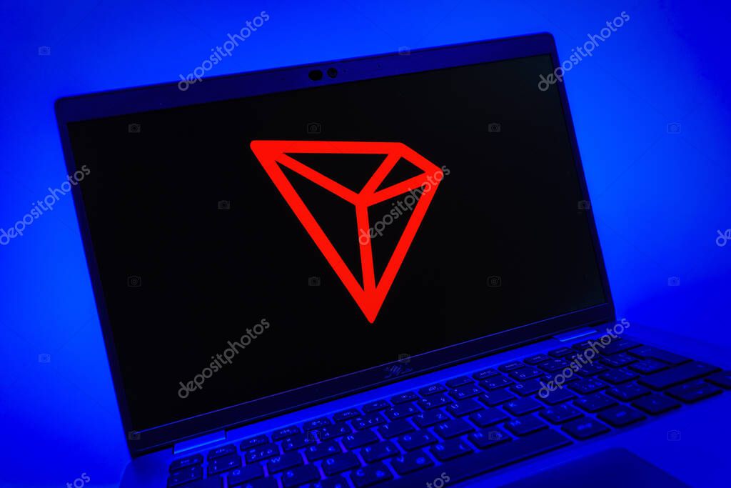 Prague, Czechia - 08 01 2025: A close-up view of a laptop screen displaying the Tron logo. Tron is a blockchain platform for decentralized applications.