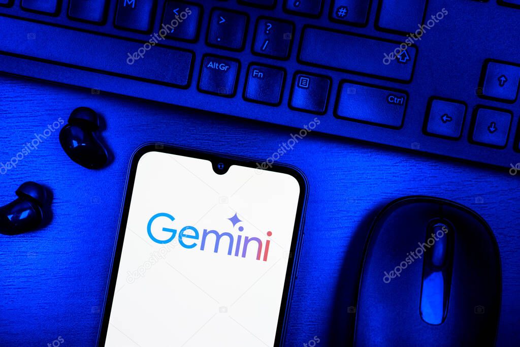 Prague, Czechia - 08 09 2025: A top-down view of a desk with a phone displaying the Gemini logo. Gemini is a platform for cryptocurrency trading and management.