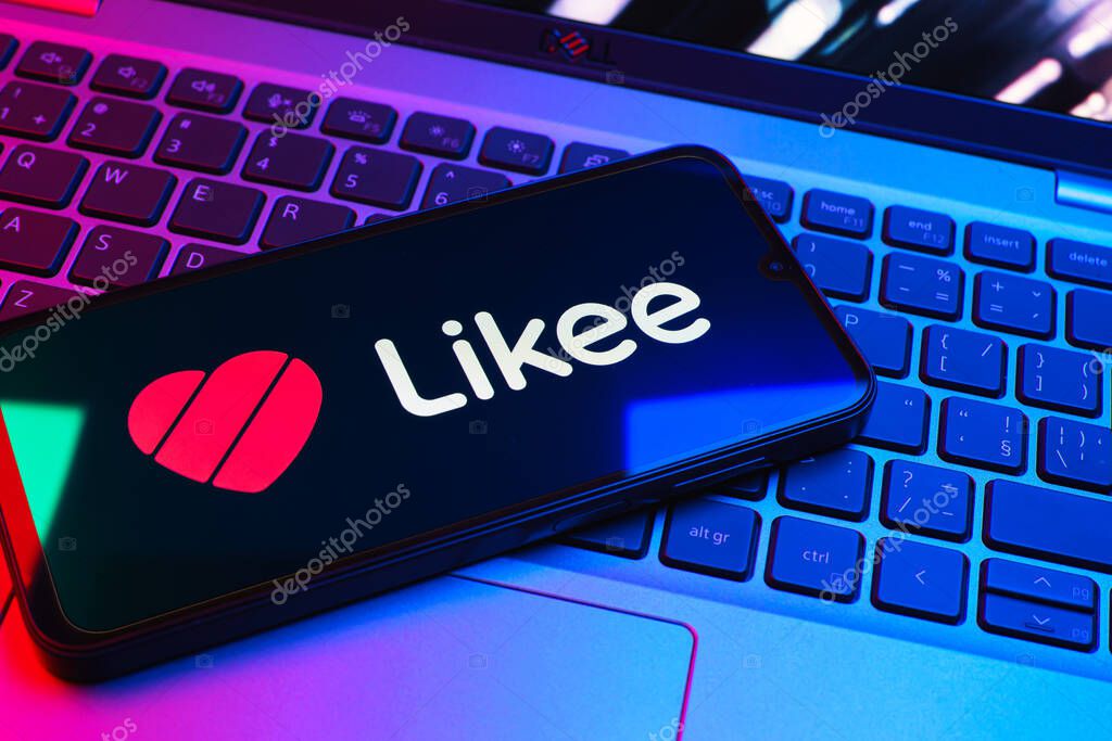 Prague, Czechia - 08 01 2025: A mobile phone lying on a laptop keyboard displays the Likee logo. Likee is a platform for creating and sharing short videos.