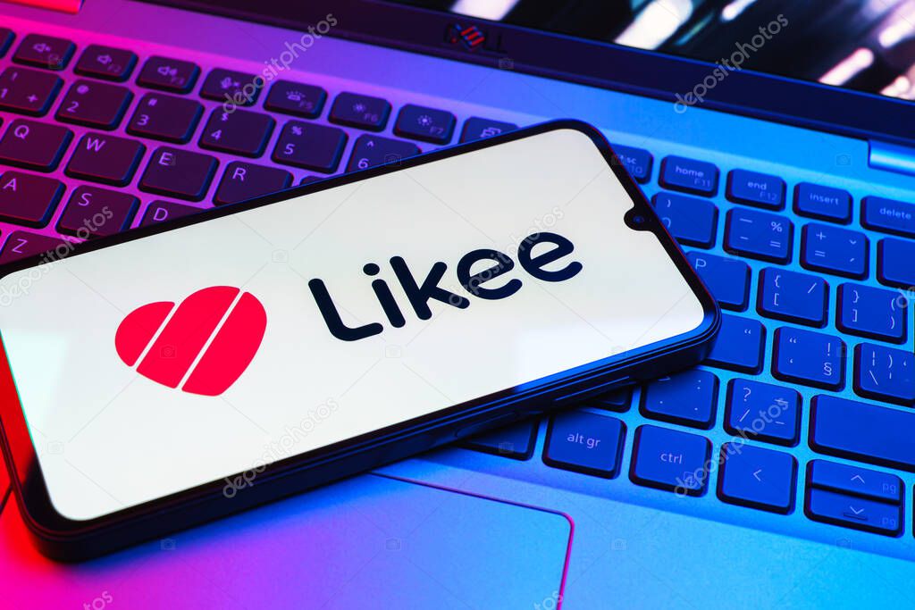 Prague, Czechia - 08 01 2025: A mobile phone lying on a laptop keyboard displays the Likee logo. Likee is a platform for creating and sharing short videos.