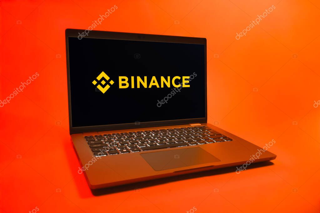 Prague, Czechia - 08 01 2025: A laptop on a uniform background displays the Binance logo. Binance is a cryptocurrency exchange for trading digital assets.