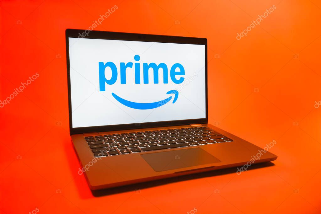 Prague, Czechia - 08 01 2025: A laptop on a uniform background displays the Prime logo. Prime is a subscription service for shopping, streaming, and benefits.