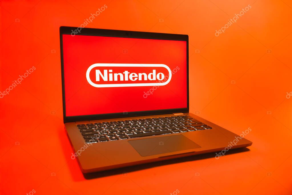 Prague, Czechia - 08 01 2025: A laptop on a uniform background displays the Nintendo logo. Nintendo is a company producing video game consoles and games.