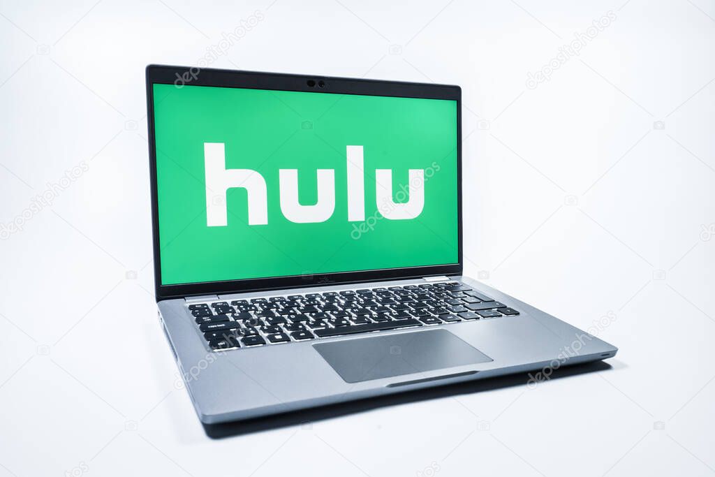 Prague, Czechia - 08 01 2025: A laptop on a uniform background displays the Hulu logo. Hulu is a streaming platform for TV shows, movies, and live TV.