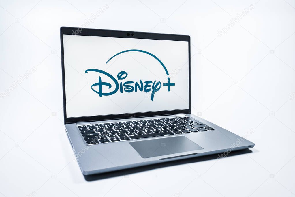 Prague, Czechia - 08 01 2025: A laptop on a uniform background displays the Disney+ logo. Disney + is a streaming platform for movies and TV shows.