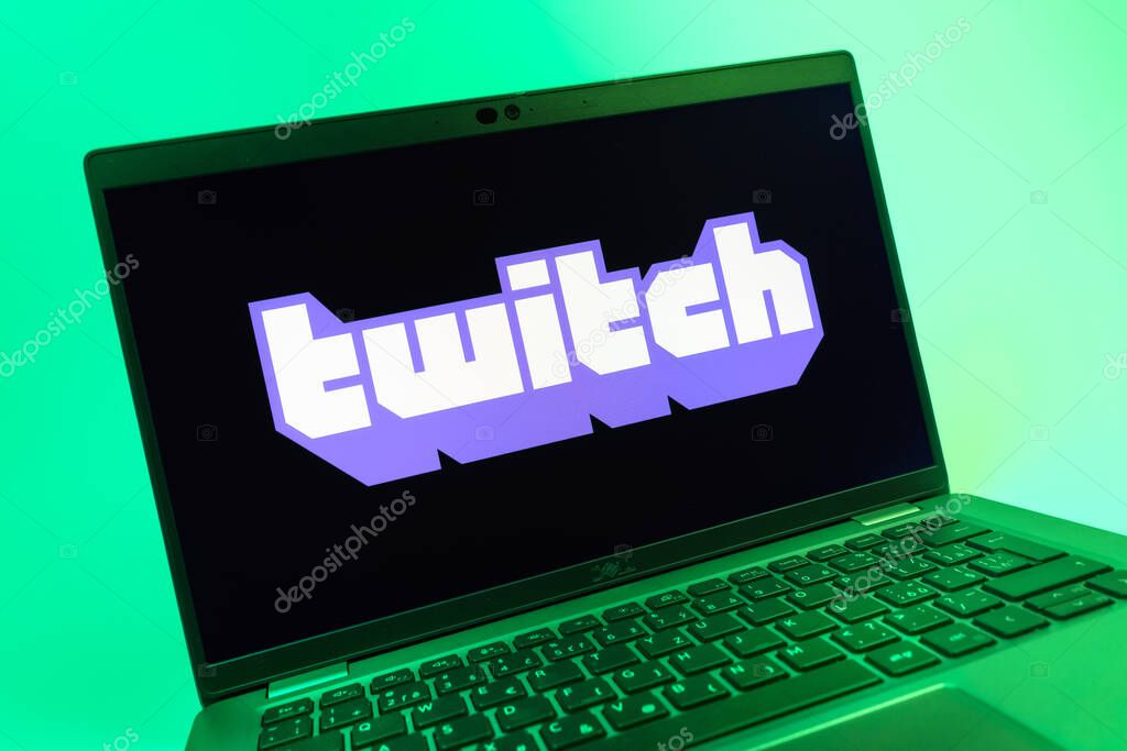 Prague, Czechia - 08 01 2025: A close-up view of a laptop screen displaying the Twitch logo. Twitch is a platform for live streaming games and content.