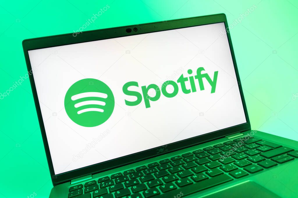 Prague, Czechia - 08 01 2025: A close-up view of a laptop screen displaying the Spotify logo. Spotify is a platform for streaming and discovering music.