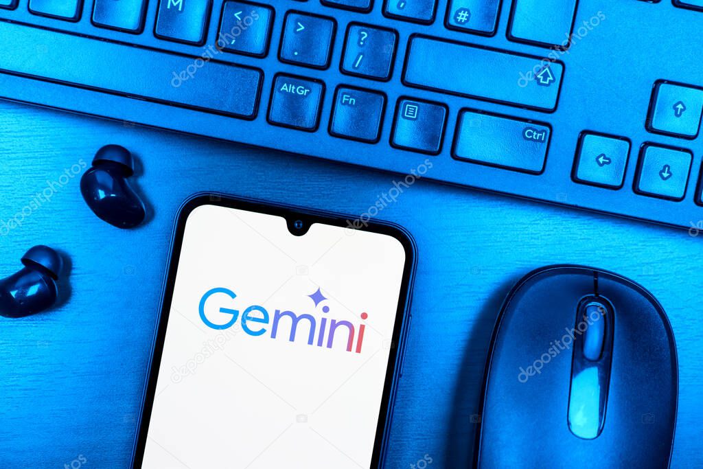 Prague, Czechia - 08 09 2025: A top-down view of a desk with a phone displaying the Gemini logo. Gemini is a platform for cryptocurrency trading and management.