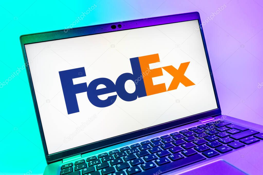 Prague, Czechia - 08 01 2025: A close-up view of a laptop screen displaying the FedEX logo. FedEX is a logistics company providing shipping and courier services.