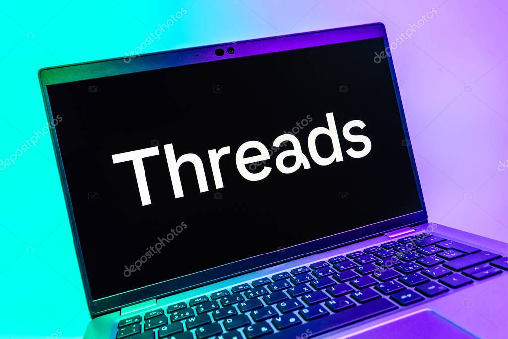 Prague, Czechia - 08 01 2025: A close-up view of a laptop screen displaying the Threads logo. Threads is a social media platform for sharing short posts and updates.