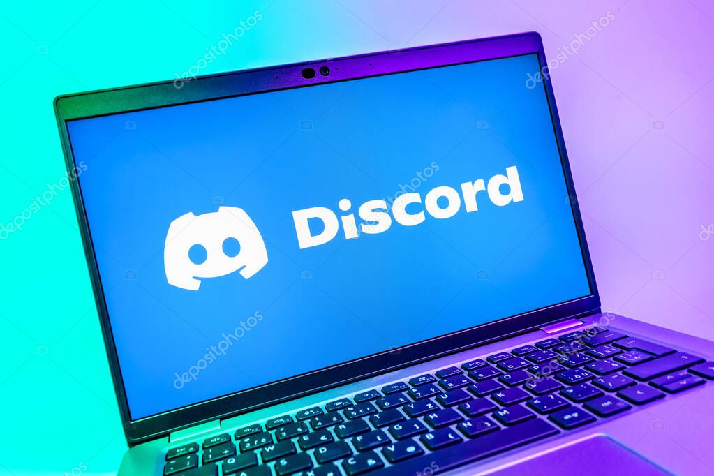 Prague, Czechia - 08 01 2025: A close-up view of a laptop screen displaying the Discord logo. Discord is a platform for voice, video, and text communication.