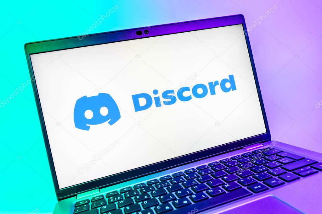 Prague, Czechia - 08 01 2025: A close-up view of a laptop screen displaying the Discord logo. Discord is a platform for voice, video, and text communication.