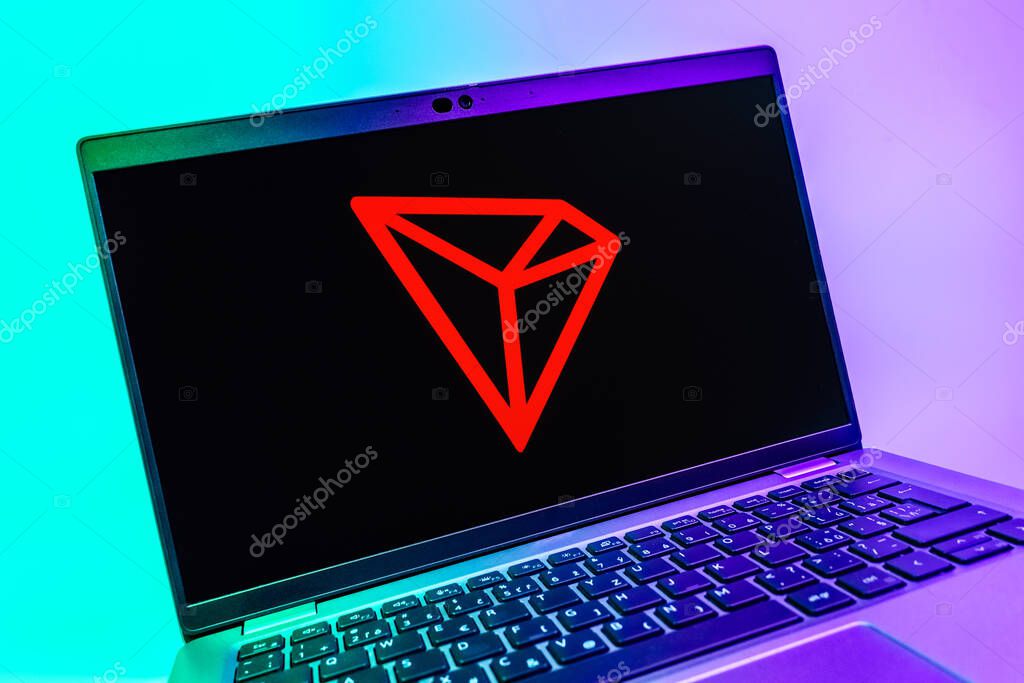 Prague, Czechia - 08 01 2025: A close-up view of a laptop screen displaying the Tron logo. Tron is a blockchain platform for decentralized applications.