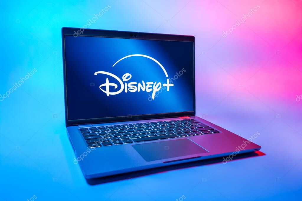 Prague, Czechia - 08 01 2025: A laptop on a uniform background displays the Disney+ logo. Disney + is a streaming platform for movies and TV shows.
