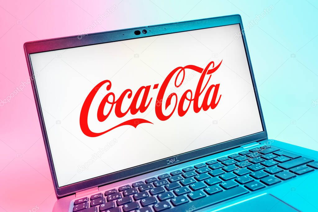 Prague, Czechia - 08 01 2025: A close-up view of a laptop screen displaying the Coca-Cola logo. Coca-Cola is a beverage company known for its soft drinks.