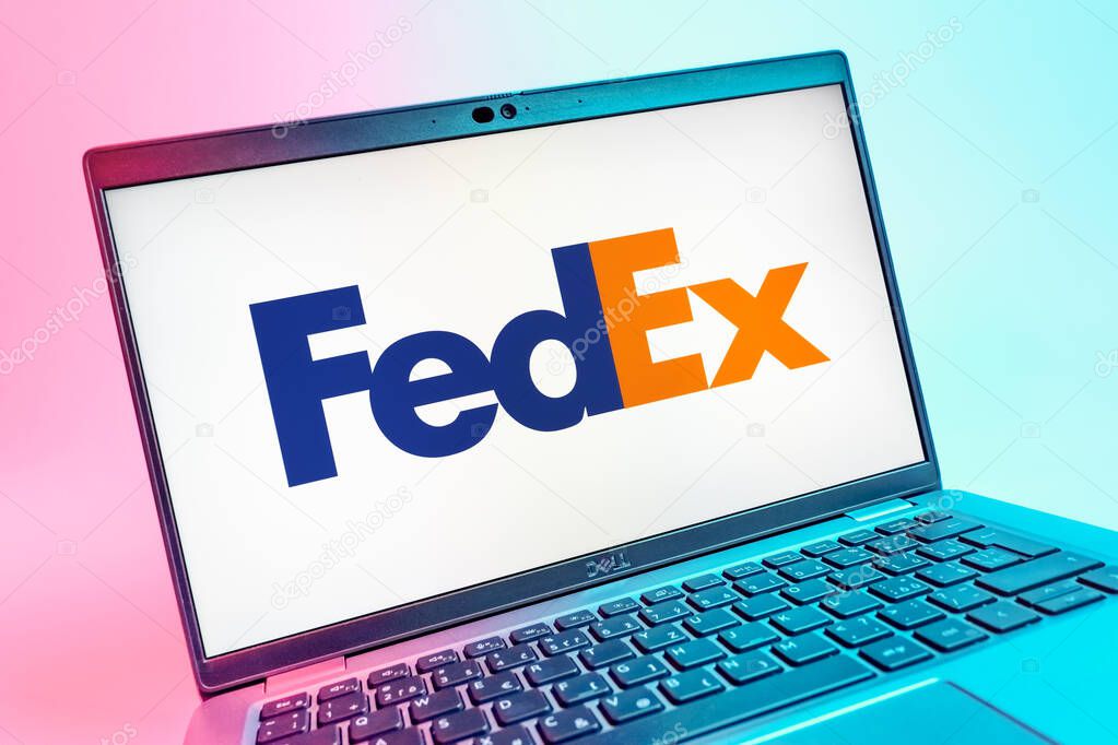 Prague, Czechia - 08 01 2025: A close-up view of a laptop screen displaying the FedEX logo. FedEX is a logistics company providing shipping and courier services.