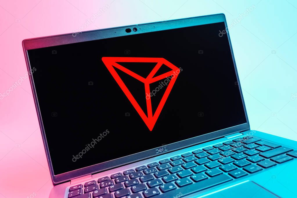 Prague, Czechia - 08 01 2025: A close-up view of a laptop screen displaying the Tron logo. Tron is a blockchain platform for decentralized applications.