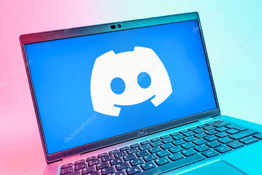 Prague, Czechia - 08 01 2025: A close-up view of a laptop screen displaying the Discord logo. Discord is a platform for voice, video, and text communication.