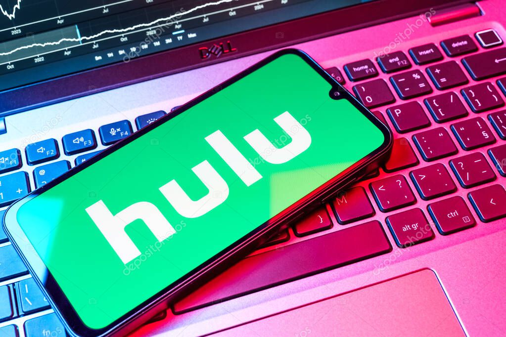 Prague, Czechia - 08 18 2025: A mobile phone on a keyboard displays Hulu logo. Hulu is a streaming platform for TV shows, movies, and live TV.