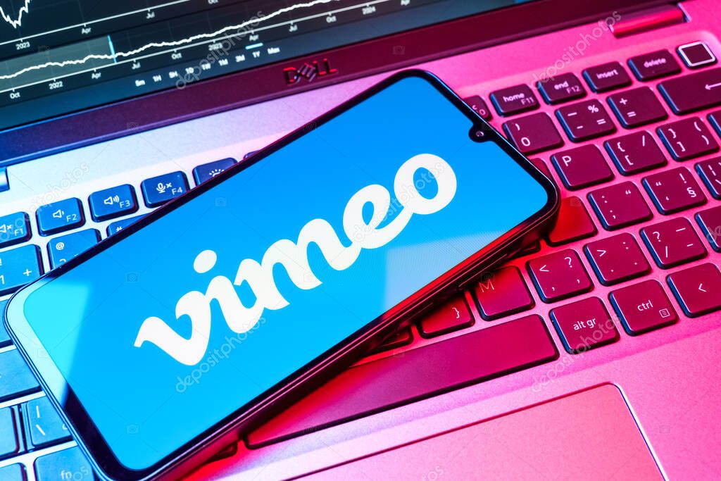 Prague, Czechia - 08 18 2025: A mobile phone on a keyboard displays Vimeo logo. Vimeo is a platform for hosting and sharing high-quality videos.