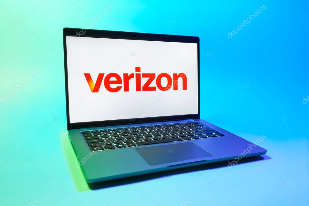 Prague, Czechia - 08 01 2025: A laptop on a uniform background displays the Verizon logo. Verizon is a telecom company providing wireless and broadband services.