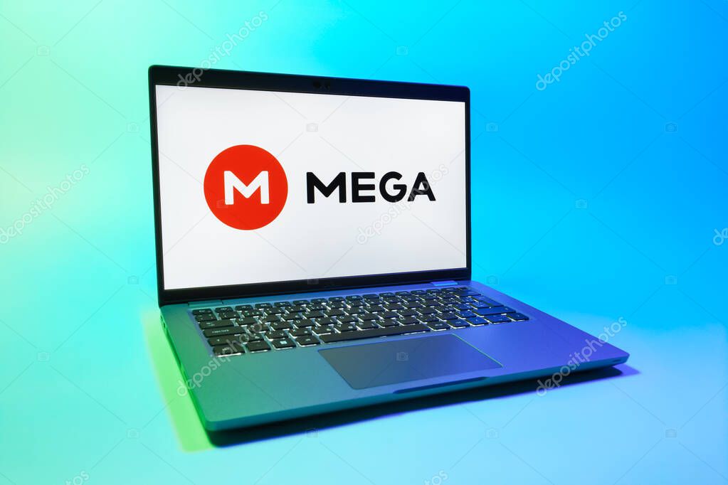 Prague, Czechia - 08 01 2025: A laptop on a uniform background displays the Mega logo. Mega is a platform for cloud storage with encrypted file sharing.