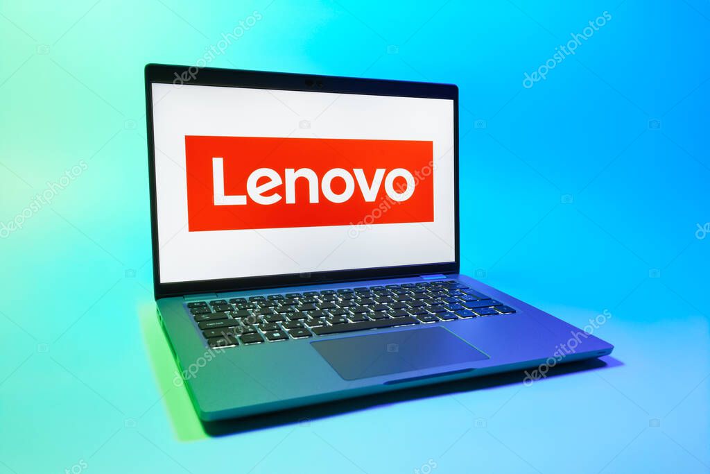 Prague, Czechia - 08 01 2025: A laptop on a uniform background displays the Lenovo logo. Lenovo is a technology company producing computers and electronics.