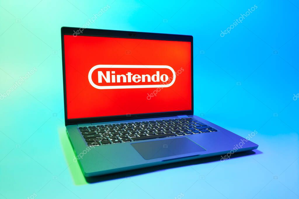 Prague, Czechia - 08 01 2025: A laptop on a uniform background displays the Nintendo logo. Nintendo is a company producing video game consoles and games.