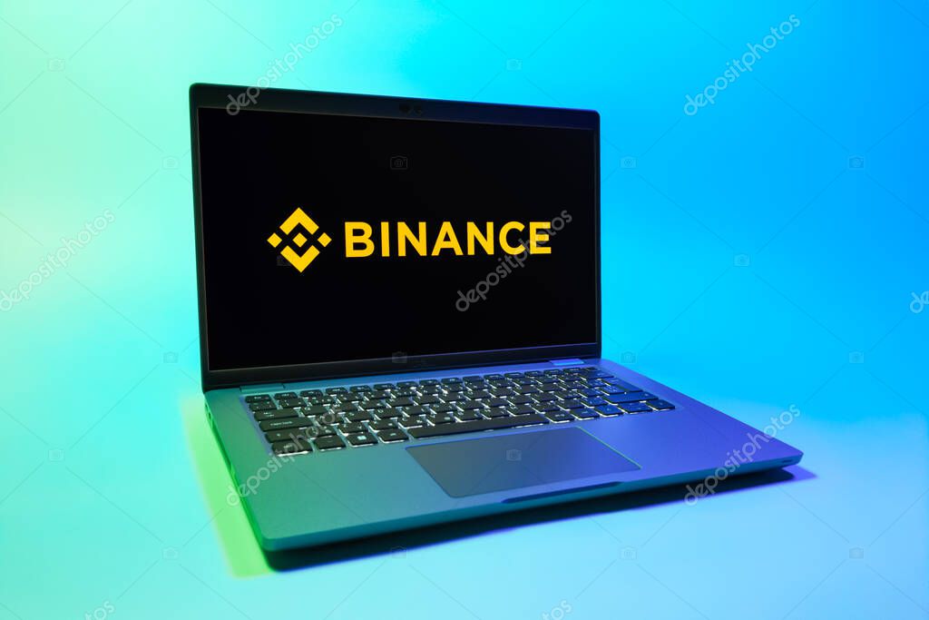 Prague, Czechia - 08 01 2025: A laptop on a uniform background displays the Binance logo. Binance is a cryptocurrency exchange for trading digital assets.