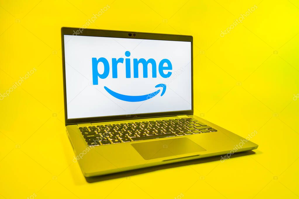 Prague, Czechia - 08 01 2025: A laptop on a uniform background displays the Prime logo. Prime is a subscription service for shopping, streaming, and benefits.