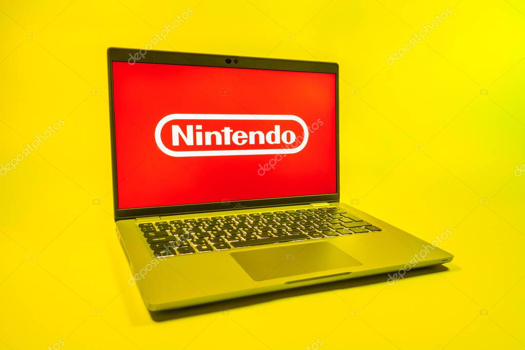 Prague, Czechia - 08 01 2025: A laptop on a uniform background displays the Nintendo logo. Nintendo is a company producing video game consoles and games.